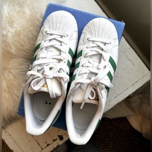 Green adidas superstars